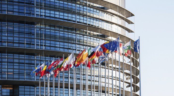 All European Union flags in front of parliament eu